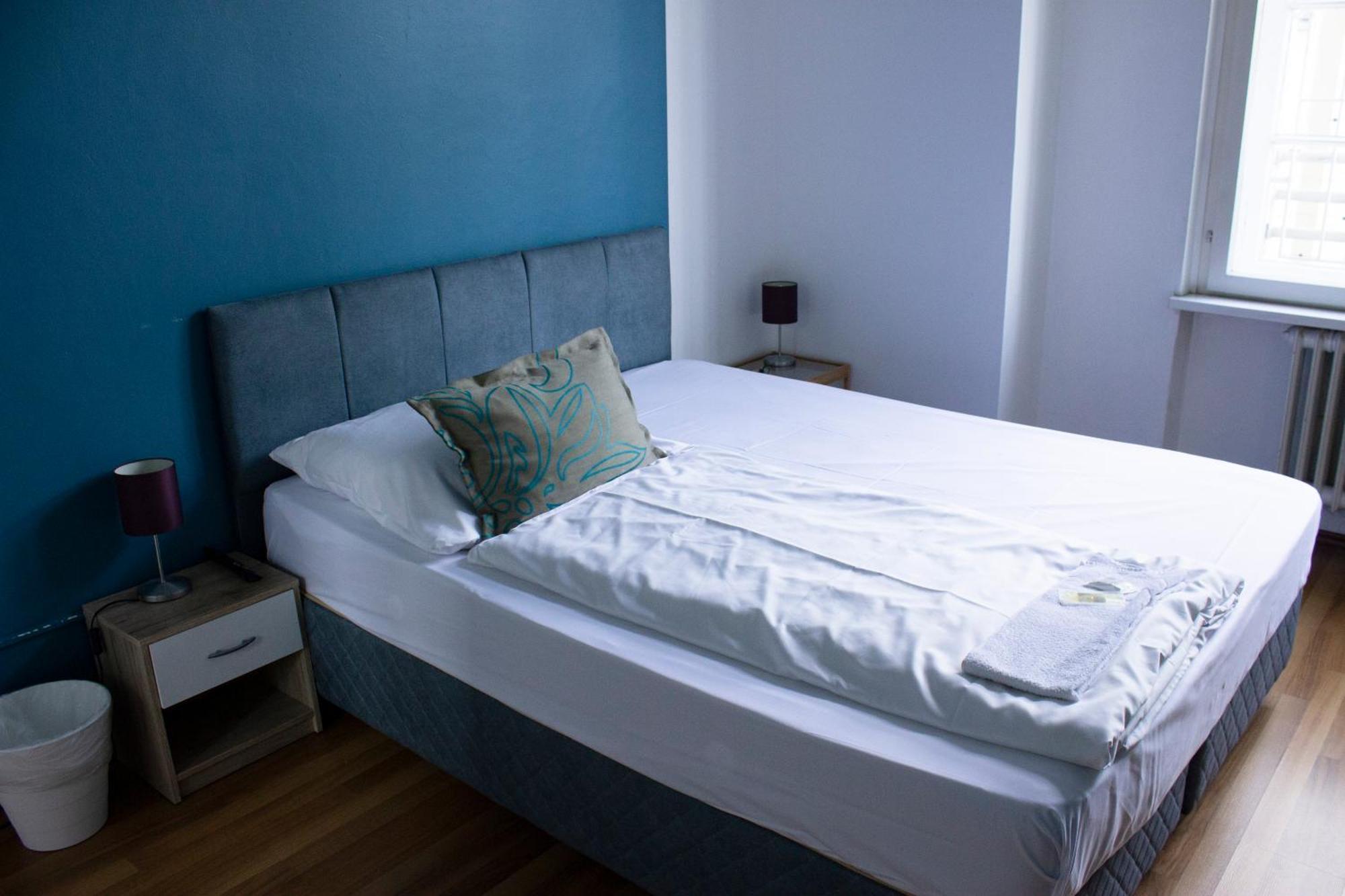 Quadruple Room with Shared Bathroom